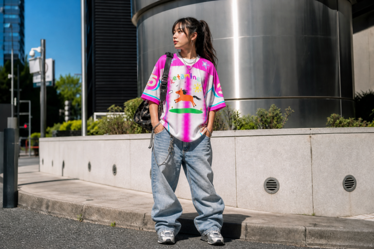 Y2K jersey styled with baggy jeans and retro accessories